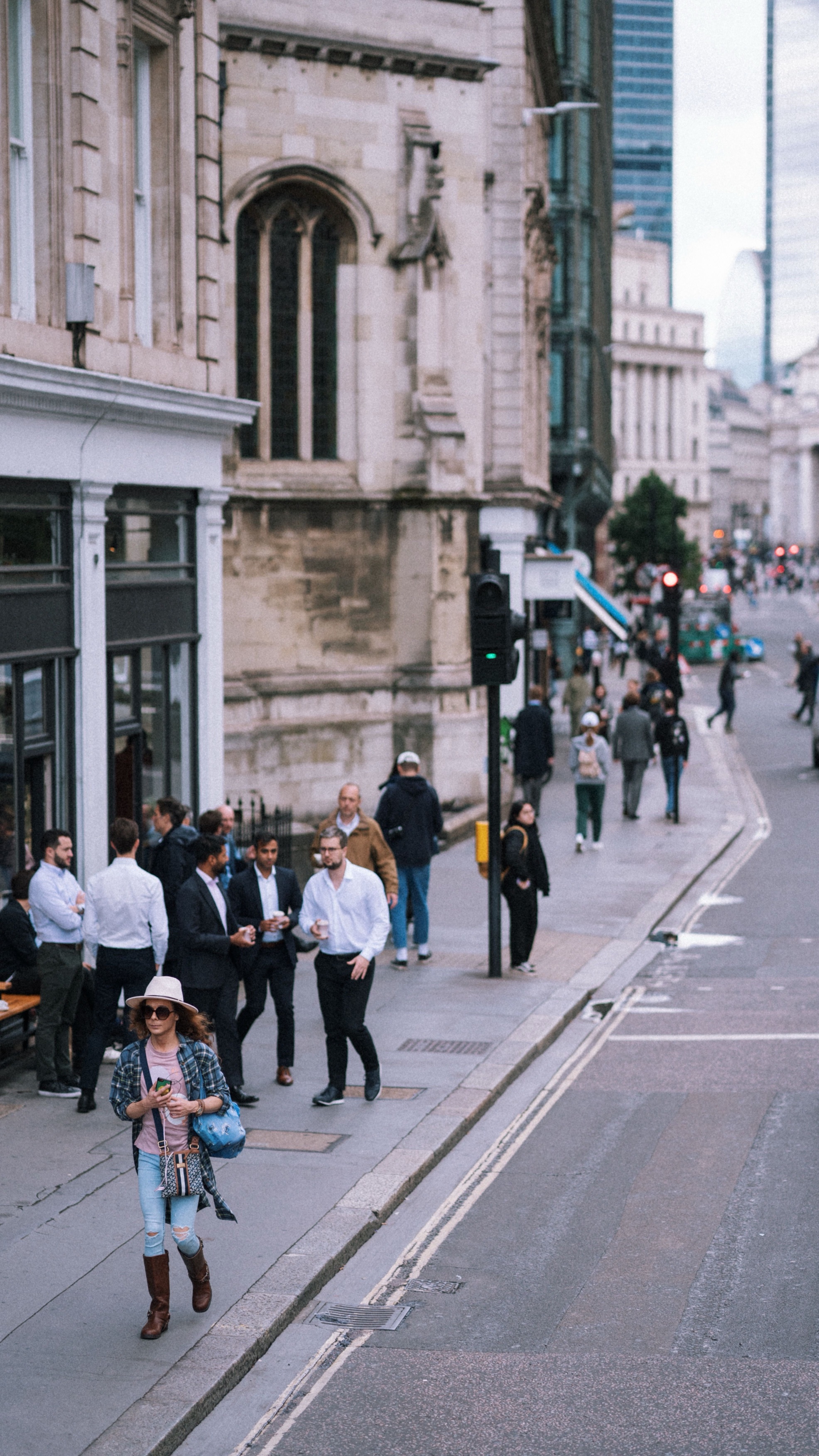 Office workers and commuters on a city street in a business district