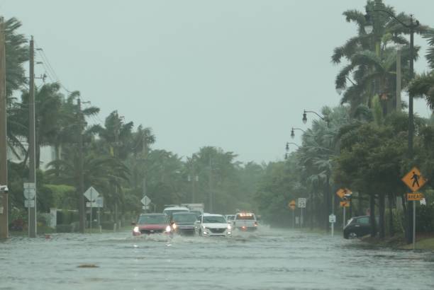 A flooded road, a natural disaster. 