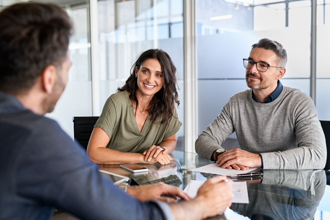 Mature couple meeting a financial advisor